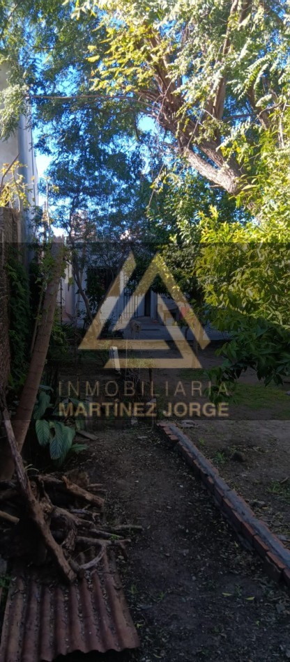 Vendo propiedad con buen terreno zona centro para desarrollo